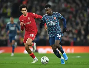 Arsenal's Eddie Nketiah Faces Off Against Liverpool's Trent Alexander-Arnold in Carabao Cup Semi-Final Clash
