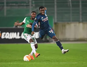 Arsenal's Eddie Nketiah Faces Off Against Rapid Wien's Kelvin Arase in Europa League Clash