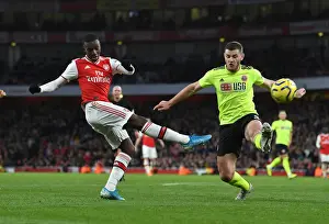 Arsenal's Eddie Nketiah Faces Off Against Sheffield United's Jack O'Connell in Intense Premier League Showdown