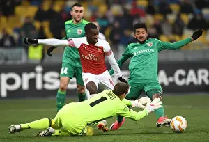 FC Vorskla Poltava V Arsenal 2018-19 Prints: Arsenal's Eddie Nketiah Faces Off Against Vorskla Duo in Europa League Clash