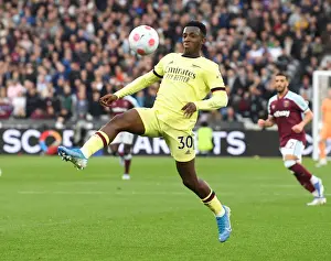 West Ham United V Arsenal 2021-22 Prints: Arsenal's Eddie Nketiah Faces Off Against West Ham in Intense Premier League Clash