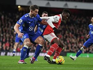 Images Dated 1st March 2023: Arsenal's Eddie Nketiah Fends Off Everton's James Tarkowski in Intense Premier League Clash