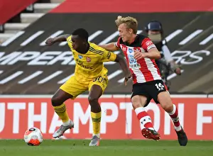 Southampton V Arsenal 2019-20 Prints: Arsenal's Eddie Nketiah Fends Off Southampton's James Ward-Prowse in Intense Premier League Clash