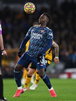 Images Dated 10th February 2022: Arsenal's Eddie Nketiah Goes Head-to-Head with Wolverhampton Wanderers in Premier League Battle