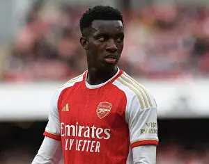 Arsenal V Tottenham Hotspur 2023-24 Prints: Arsenal's Eddie Nketiah Goes Head-to-Head with Tottenham in the Intense 2023-24 Premier League Showdown