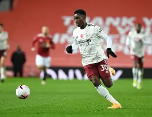 Arsenal's Eddie Nketiah at Manchester United's Old Trafford: Premier League Clash Amidst COVID-19 Restrictions (2020-21)