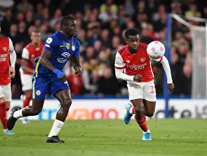 Arsenal's Eddie Nketiah Outmaneuvers Chelsea's Malang Sarr in Premier League Clash