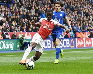 Leicester City V Arsenal 2018-19 Prints: Arsenal's Eddie Nketiah Outmaneuvers Leicester's Ben Chilwell in Thrilling Premier League Clash