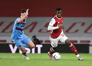 Arsenal's Eddie Nketiah Outmaneuvers West Ham's Declan Rice in Premier League Clash