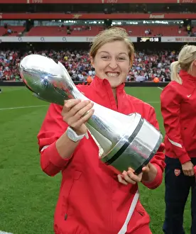 Arsenal's Ellen White Celebrates with WSL Trophy Amidst Arsenal's 1:0 Lead over Swansea City in the Premier League, Emirates Stadium (2011)
