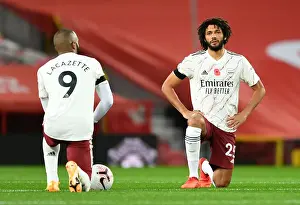 Arsenal's Elneny Kneels at Empty Old Trafford in Manchester United vs Arsenal (2020-21)