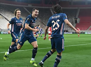 Images Dated 12th March 2021: Arsenal's Elneny and Xhaka Celebrate Goals in Empty Karaiskakis Stadium during Olympiacos Clash in