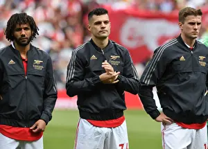 Arsenal's Elneny, Xhaka, and Holding Prepare for Arsenal v Everton Clash (2021-22)