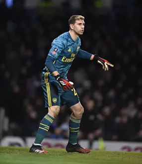 Arsenal's Emi Martinez in Action: FA Cup Battle at Portsmouth