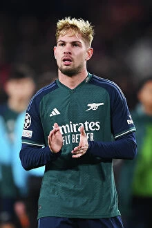 PSV Eindoven v Arsenal 2023-24 Collection: Arsenal's Emile Smith Rowe Applauds Fans After PSV Eindhoven Victory in 2023-24 UEFA Champions