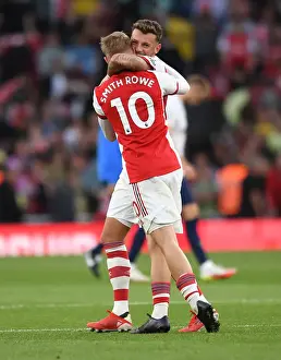 Arsenal's Emile Smith Rowe and Ben White Embrace in Victory: Arsenal v Tottenham Hotspur, Premier League 2021-22
