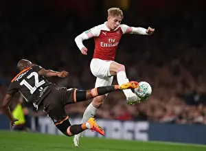 Arsenal V Brentford - Carabao Cup 2018-19 Prints: Arsenal's Emile Smith Rowe Clashes with Brentford's Kamohelo Mokotjo in Carabao Cup Showdown