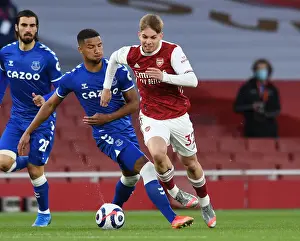 Arsenal's Emile Smith Rowe Clashes with Everton's Mason Holgate in Premier League Showdown