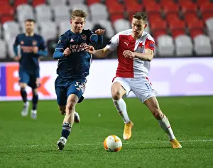 Arsenal's Emile Smith Rowe Faces Off Against Slavia Praha's Lukas Provod in Europa League Quarterfinal Match, Prague, 2021