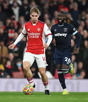 Arsenal's Emile Smith Rowe Outmaneuvers West Ham's Arthur Masuaku in Premier League Clash