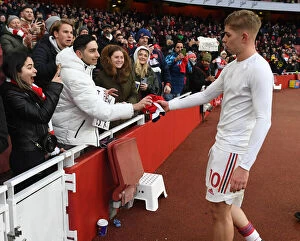 Arsenal v Newcastle United 2021-22 Collection: Arsenal's Emile Smith Rowe Shirt Donation to a Fan after Arsenal vs Newcastle United (2021-22)