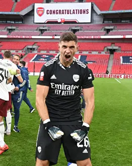 Arsenal's Emiliano Martinez Celebrates FA Community Shield Victory over Liverpool