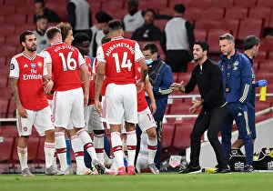 Images Dated 15th July 2020: Arsenal's Empty Emirates: Mikel Arteta Coaches Team Against Liverpool Amidst Pandemic (2019-20)