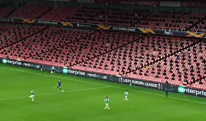 Arsenal's Emirates Stadium: A Ghostly Europa League Showdown Against Rapid Wien (December 2020)