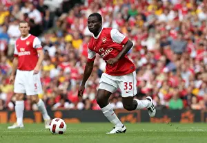 Arsenal V AC Milan 2010-11 Prints: Arsenal's Emmanuel Frimpong Goes Head-to-Head with AC Milan in Emirates Cup Clash