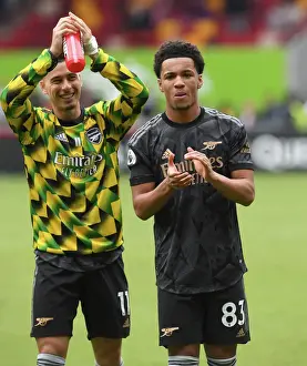 Arsenal's Ethan Nwaneri and Gabriel Martinelli Celebrate Victory with Fans at Brentford Community Stadium