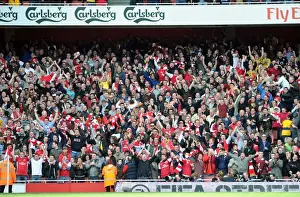 Arsenal V Tottenham 2011-12 Prints: Arsenal's Euphoric Goal Celebration: Defeating Tottenham in the Premier League (2011-12)