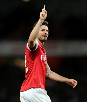 Arsenal V Liverpool 2013-14 Prints: Arsenal's Euphoric Victory: Olivier Giroud's Iconic Moment after Defeating Liverpool in the Premier League