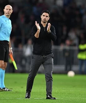 PSV Eindhoven v Arsenal 2022-23 Collection: Arsenal's Europa League Battle: Mikel Arteta Applauds Fans After PSV Victory