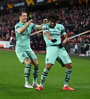 Stade Rennes V Arsenal 2018-19 Prints: Arsenal's Europa League Victory: Iwobi and Xhaka's Unforgettable Goal Celebration vs