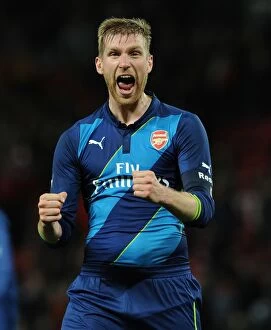 Images Dated 13th February 2009: Arsenal's FA Cup Triumph: Per Mertesacker's Victory Celebration vs. Manchester United