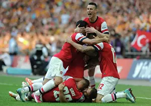 Arsenal's FA Cup Triumph: Ramsey's Hat-Trick and Euphoric Team Celebration