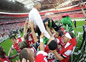 Arsenal's FA Cup Triumph: Wenger Lifted High Amidst Jubilant Squad