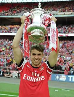Arsenal's FA Cup Victory: Aaron Ramsey Lifts the Trophy after Defeating Hull City
