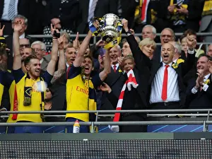 Arsenal's FA Cup Victory: Arsene Wenger and Nacho Monreal Celebrate with the Trophy (2015)
