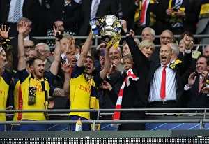 Arsenal's FA Cup Victory: Arsene Wenger and Nacho Monreal Celebrate with the Trophy (2015)