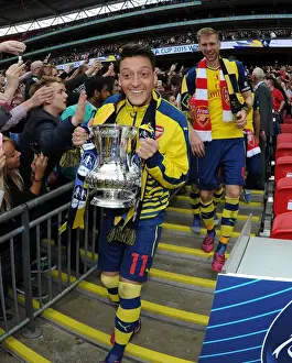 Arsenal's FA Cup Victory: Mesut Özil's Triumphant Moment at Wembley Stadium (2015)