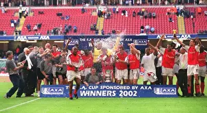 Arsenal's FA Cup Victory: The Squad Celebrates at The AXA FA Cup Final, Millennium Stadium, Cardiff, Wales (April 5, 2002) - Credit: Stuart MacFarlane / Arsenal Football Club