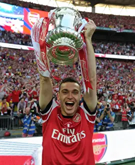 Arsenal V Hull City - FA Cup Final 2014 Prints: Arsenal's FA Cup Victory: Thomas Vermaelen Lifts the Trophy after Defeating Hull City
