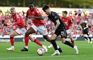Images Dated 20th May 2023: Arsenal's Fabio Vieira Soars Past Nottingham Forest's Willy Boly: Premier League Clash 2022-23