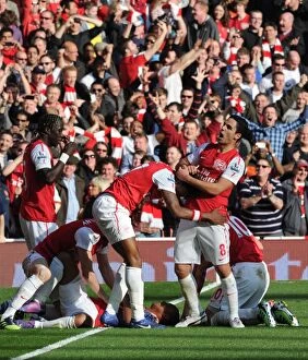 Images Dated 26th February 2012: Arsenal's Five-Goal Blitz: Mikel Arteta and Alex Song Celebrate Theo Walcott's Goal vs