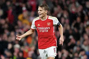 Arsenal V PSV Eindhoven 2023-24 Prints: Arsenal's Four-Goal Blitz: Martin Odegaard Celebrates Against PSV Eindhoven in the 2023-24 UEFA Champions League