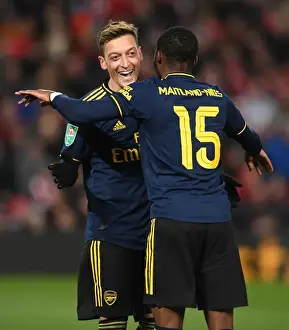 Arsenal's Four-Goal Blitz: Ozil and Maitland-Niles Jubilant Moment at Anfield