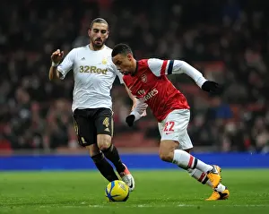 Arsenal V Swansea - FA Cup 3rd Rd Replay 2012-13 Prints: Arsenal's Francis Coquelin Clashes with Swansea's Chico Flores in FA Cup Third Round Replay