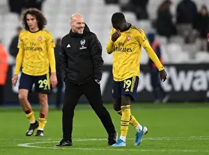 Arsenal's Freddie Ljungberg Consoles Nicolas Pepe after West Ham Clash