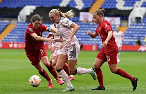Arsenal's Frida Maanum Scores Past Liverpool's Defense in FA WSL Clash